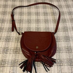 Calvin Klein red leather one shoulder hand bag with front tassel